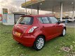 Suzuki Swift - 1.2 Comfort EASSS - 5DRS/NAVI/NAP - 1 - Thumbnail