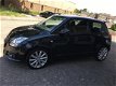 Suzuki Swift - 125 pk / CLIMATE/ KEYLESS/ STOELVERWARMING/ NIEUWE APK - 1 - Thumbnail