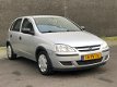 Opel Corsa - 1.2-16V Rhythm - 1 - Thumbnail