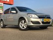 Opel Astra - 1.8 Enjoy *PDC *Navi *Mediascherm *Xenon *NAP - 1 - Thumbnail