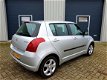 Suzuki Swift - 1.5 Exclusive | Airco | Keyless entry | LMV - 1 - Thumbnail