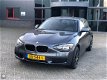 BMW 1-serie - 116i Sport Aut8 PDC/Keyless Go/Stoelv - 1 - Thumbnail