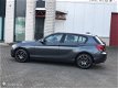 BMW 1-serie - 116i Sport Aut8 PDC/Keyless Go/Stoelv - 1 - Thumbnail