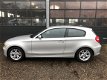 BMW 1-serie - 118i Business Line NIEUWSTAAT 133.000 km - 1 - Thumbnail