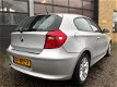 BMW 1-serie - 118i Business Line NIEUWSTAAT 133.000 km - 1 - Thumbnail