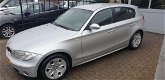 BMW 1-serie - 118d High Executive Airco nap apk bij aflevering - 1 - Thumbnail