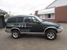 SsangYong Musso - 602 L hoog