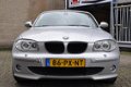 BMW 1-serie - 116i High Executive motor kapot - 1 - Thumbnail