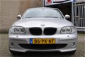 BMW 1-serie - 116i High Executive motor kapot - 1 - Thumbnail