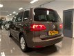 Volkswagen Touran - 1.4 TSI Highline Automaat * 1e Eig / Xenon / Panoramadak - 1 - Thumbnail