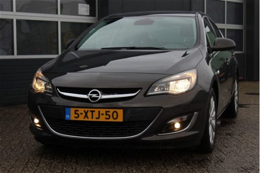 Opel Astra - 1.4 Turbo Sport (141pk) CAMERA/ Automaat/ HALF-LEDER/ Navi/ Clima/ Cruise/ Elek. pakket - 1
