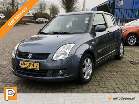 Suzuki Swift - 1.3 Shogun 5 DEURS/AIRCO/BLUETOOTH/CRUISE/LM. VELGEN rijklaarprijs - 1