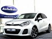 Kia Rio - 1.4 CVVT Executive NAVI CAMERA BLUET LEDER PDC STOELVERW. '15 - 1 - Thumbnail