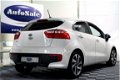 Kia Rio - 1.4 CVVT Executive NAVI CAMERA BLUET LEDER PDC STOELVERW. '15 - 1 - Thumbnail