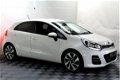 Kia Rio - 1.4 CVVT Executive NAVI CAMERA BLUET LEDER PDC STOELVERW. '15 - 1 - Thumbnail