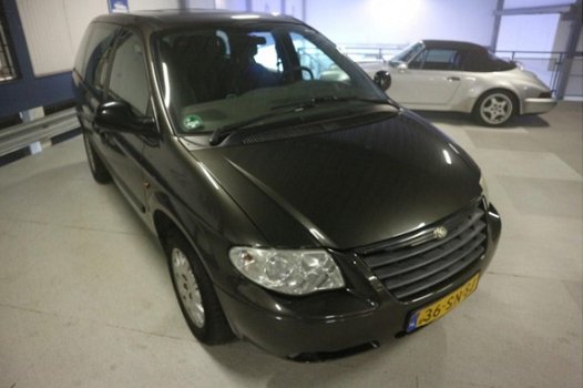 Chrysler Voyager - 2.4i SE Luxe 7 PERS / NAP / KEURIGE AUTO - 1