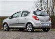 Opel Corsa - 1.4-16V Edition / 1e eigenaar / bekende historie / airco / cruise / extra set winterban - 1 - Thumbnail