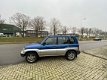 Mitsubishi Pajero Pinin - 2.0 GDI GLX Long Body PAJERO PININ; 2.0 GDI 5DRS 4X4 - 1 - Thumbnail