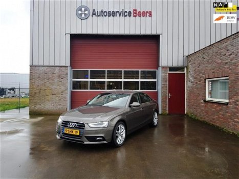 Audi A4 - 1.8 TFSIe Edition Navi, Trekhaak, LMV, Led, Xenon, Cruise, Climate, Garantie, Rijklaarprij - 1