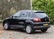 Volkswagen Tiguan - 1.4 TSI Sport&Style / trekhaak / cruise control / privacy glass achter / cruise - 1 - Thumbnail