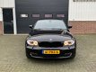 BMW 1-serie - 118i EffDyn. Ed. Business Line Ultimate Edition /NAVI/LEER/XENON/17INCH/ - 1 - Thumbnail