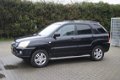 Kia Sportage - 2.0 CVVT X-ecutive 4WD 4x4, Leder, Trekhaak - 1 - Thumbnail