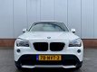 BMW X1 - sDrive18i Exe | Aut | Panoramadak | Xenon - 1 - Thumbnail