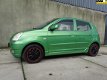 Kia Picanto - 1.1 LXE trekhaak, airco - 1 - Thumbnail