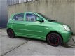 Kia Picanto - 1.1 LXE trekhaak, airco - 1 - Thumbnail