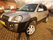 Hyundai Tucson - 2.0i Dynamic Zeer Nette auto, Dealer Onderhouden - 1 - Thumbnail