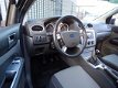 Ford Focus Wagon - 1.6 Comfort 1ste eig., Airco, Lcihtm. velg - 1 - Thumbnail