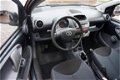Toyota Aygo - 1.0-12V + 5 drs 99.449 km nap - 1 - Thumbnail