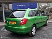 Skoda Fabia Combi - - 1.2 TSI Greentech Style Airco Leder Cruise Xenon Parkeersensor Dealerauto Nap - 1 - Thumbnail