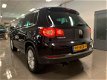 Volkswagen Tiguan - 1.4 TSI Sport&Style * 1e Eig / Navigatie / Trekhaak (af fabriek) - 1 - Thumbnail