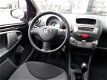 Toyota Aygo - 1.0-12V + 5-drs 93.000 km - 1 - Thumbnail