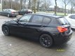 BMW 1-serie - 118i Corporate Lease Executive bj 2017 licht voor schade - 1 - Thumbnail