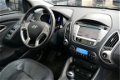 Hyundai ix35 - 2.0i i-Catcher / Panodak/ Leer/ Navi - 1 - Thumbnail