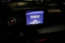 BMW 1-serie - 116i Business Line LEER + NIEUWE KETTING + NAVIGATIE