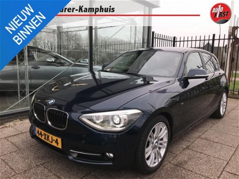 BMW 1-serie - 116i 136PK 5-Deurs Navi Xenon Sportstoelen Trekhaak - 1