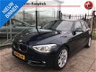BMW 1-serie - 116i 136PK 5-Deurs Navi Xenon Sportstoelen Trekhaak - 1 - Thumbnail