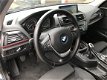 BMW 1-serie - 116i 136PK 5-Deurs Navi Xenon Sportstoelen Trekhaak - 1 - Thumbnail