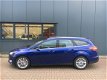 Ford Focus Wagon - 1.0 Ecob.125pk Titanium NAVI/CLIMA/PDC/17INCH/TREKHAAK - 1 - Thumbnail