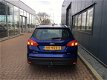 Ford Focus Wagon - 1.0 Ecob.125pk Titanium NAVI/CLIMA/PDC/17INCH/TREKHAAK - 1 - Thumbnail