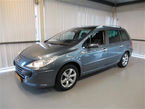 Peugeot 307 SW - 1.6-16V Premium 7pers. Navigatie/Panoramadak/Trekhaak/Climate/Cruise/Regen & Lichts - 1