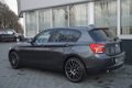 BMW 1-serie - 116i Aut. Sport Navi|Cruis|PDC|Clima Antraciet - 1 - Thumbnail