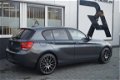 BMW 1-serie - 116i Aut. Sport Navi|Cruis|PDC|Clima Antraciet - 1 - Thumbnail