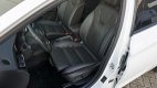 Opel Astra - 1.4 T 150pk Innovation Schuif/kanteldak AGR Leder 18inch LM Led Intellilux *NL auto* Ze - 1 - Thumbnail