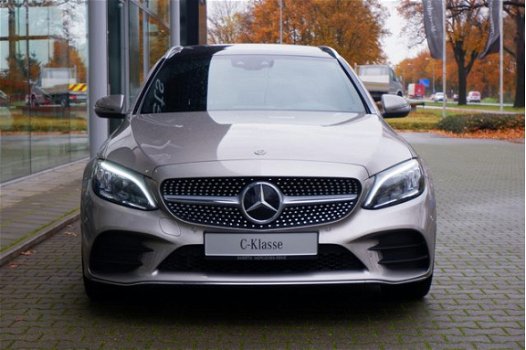 Mercedes-Benz C-klasse Estate - 180 Automaat | AMG-line | Navigatie | Panoramadak | Sfeerverlichting - 1