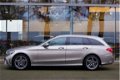 Mercedes-Benz C-klasse Estate - 180 Automaat | AMG-line | Navigatie | Panoramadak | Sfeerverlichting - 1 - Thumbnail