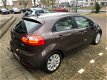 Kia Rio - 1.2 CVVT Super Pack Navi/Clima/Camera - 1 - Thumbnail